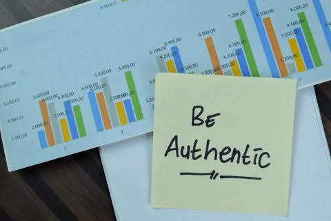 Be Authentic write on sticky notes isolated on Wooden Table. Stock Photos