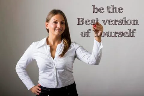 Be the Best version of Yourself - Beautiful girl writing on transparent surfa Free Stock Photos