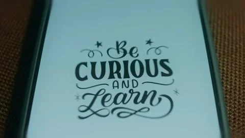 Be curious and Learn lettering text on blue background, presentation Stock Footage 310051359