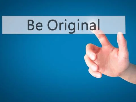 Be Original - Hand pressing a button on blurred background concept on visual  Stock Photos