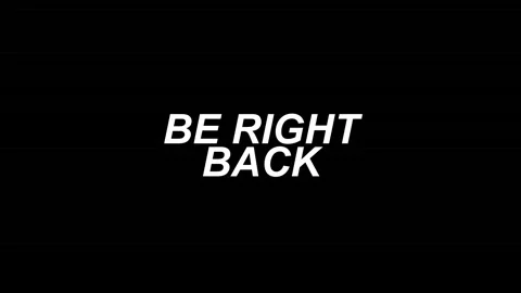 Be Right Back Digital Glitch Text on Black Background Stock Footage 345206148