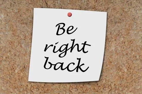 Be right back written on a memo Stock Photos