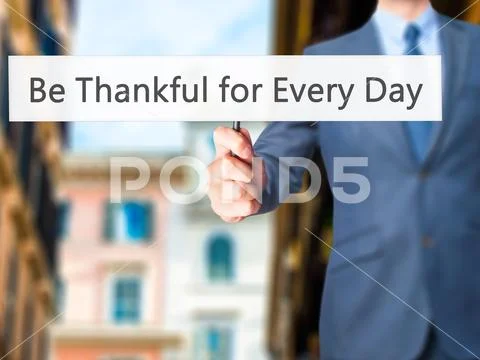 Be Thankful for Every Day - Business man showing sign Stock Photos