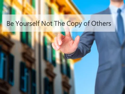 Be Yourself Not The Copy of Others - Businessman hand pressing button on touc Stock Photos
