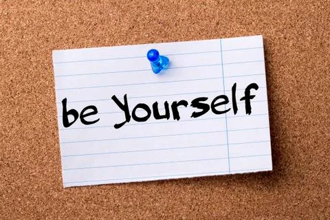 Be Yourself - teared note paper pinned on bulletin board Stock Photos