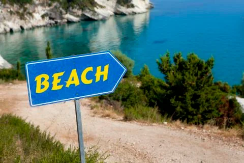 Beach access with "beach" sign Stock Photos