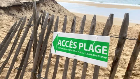 "beach access" sign of La Lagune beach in La Teste de Buch on the Arcachon bay Stock Footage 168401211