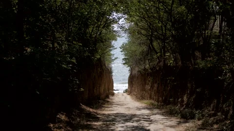 Beach access. The way of the tourist on small mountains to the sea. Stock Footage 170338095