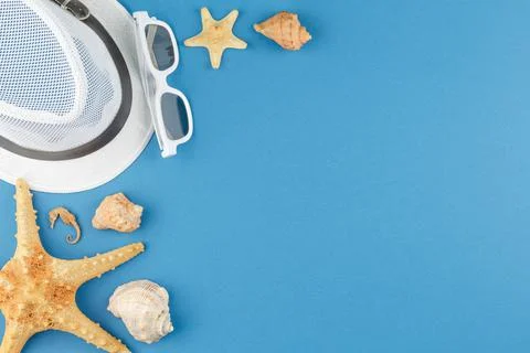 Beach accessories and shellfish with copyspace. Stock Photos