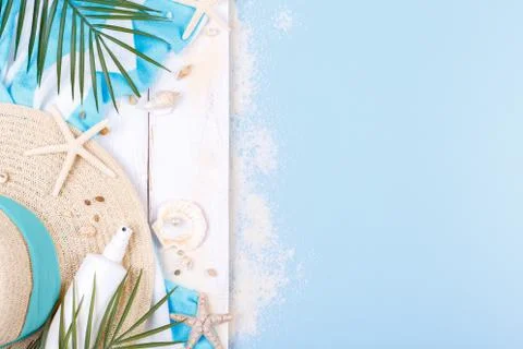 Beach accessories on the blue background Stock Photos