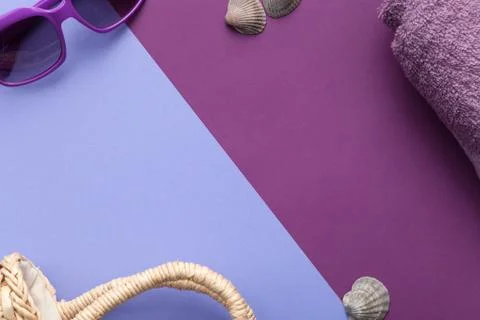 Beach Accessories on Purple Background Stock Photos