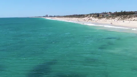 Beach Aerial of City Beach in Perth, People swimming in the clear blue water. Stock Footage 143715726