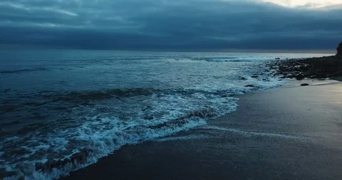 Beach Aerial Storm Clouds and the Ocean Background in 4k Stock Footage 106461641