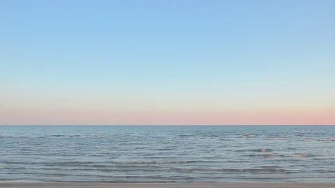 Beach the afternoon, small waves and clear blue sky Stock Footage 69858445