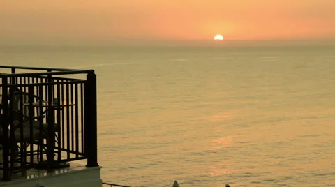 On the beach against sunrise Stock Footage 49748023