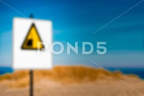 Beach alert sign - blurred image Stock Photos
