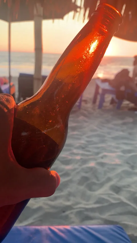 Beach and Beer Bottle Sun Ray Vertical HD Stock Footage 175520752