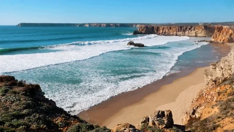 Beach and cliffs at the beautiful coast, Sagres, Algarve, Portugal Stock Footage 87208647