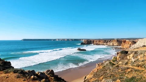 Beach and cliffs at the beautiful coast, Sagres, Algarve, Portugal Stock Footage 87208657