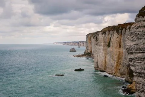 The beach and cliffs of Etretat, the Normandy tourist site of the French city Stock Photos