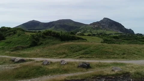 Beach and cliffs Trefor Caernarfon Wales Stock Footage 136611330