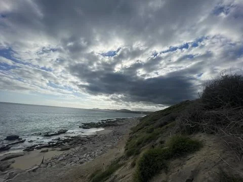 Beach and Clouds Stock Photos