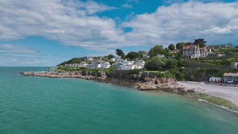 Beach and Coast over Brixham from a drone, Brixham, Torbay, Devon, England Stock Footage 247473776