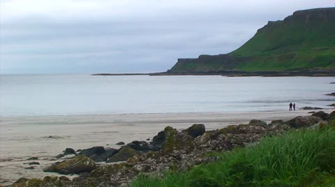 Beach and coastal mountain, only 2 people Stock Footage 39830077