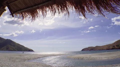 Beach and cottage inside a gulf wide shot Stock Footage 248852336