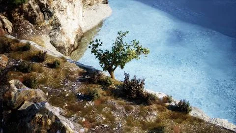 Beach and limestone cliffs against azure water Stockillustratie