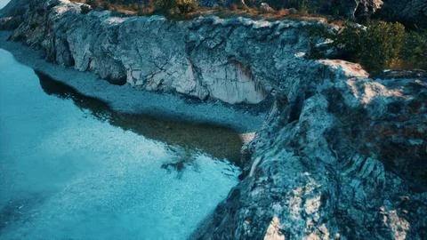 Beach and limestone cliffs against azure water 스톡 일러스트