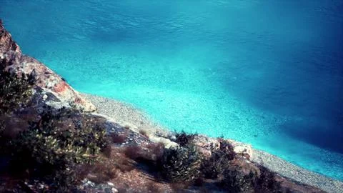 Beach and limestone cliffs against azure water 스톡 일러스트
