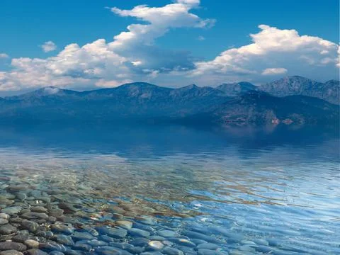 Beach and mountain range Stock Photos
