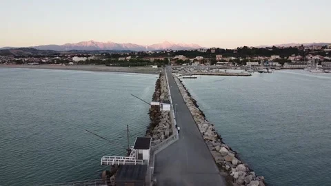 The beach and mountains in one view.  View of the port of Giulianova, Italy. Stock Footage