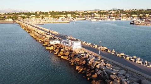 The beach and mountains in one view.  View of the port of Giulianova, Italy. 動画素材 133536944