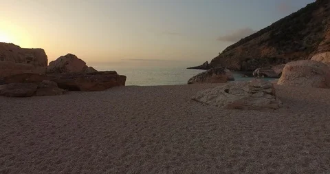 Beach and ocean at sunset Stock Footage 89964263