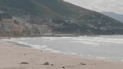 Beach and Ocean Waves in Central Vlore, Albania, Establishing Shot Video stock 245935806