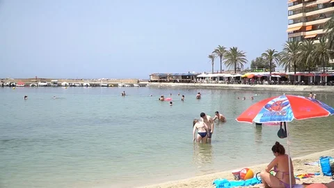 Beach and parasol Stock Footage 128348161