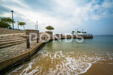Beach and pier at Repulse Bay, in Hong Kong, Hong Kong. Stock Photos