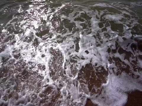 Beach and ripples waves motion before sunset Stock Footage 106533885