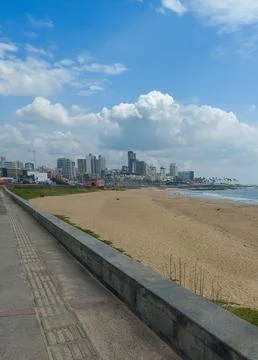 Beach and sidewalk Stock Photos