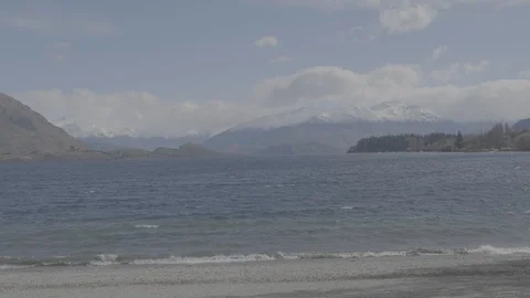 Beach and Snowcapped Mountain 4k Video stock 124509786