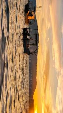 Beach and sunset Stock Photos
