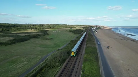 Beach and Train Drone Shot, Pevensey Bay, England Stock Footage 303282233