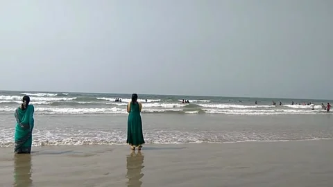 Beach and two ladies Stock Footage 154308138