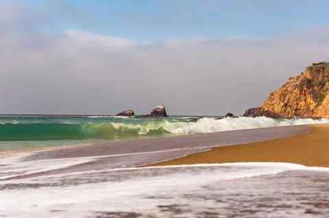 Beach and waves Stock Photos