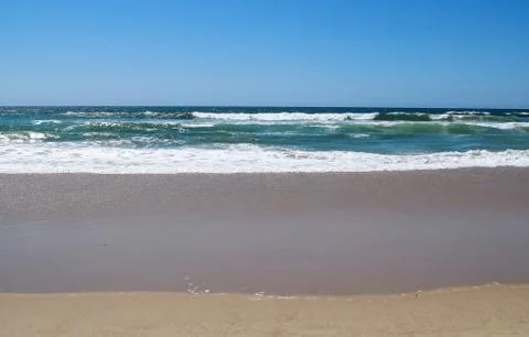 Beach and waves Stock Photos