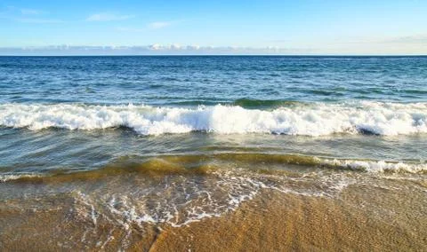 Beach and waves Stock Photos