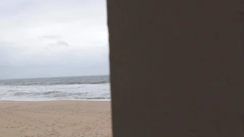 Beach and waves revealed from right overcast 스톡 동영상 91333501
