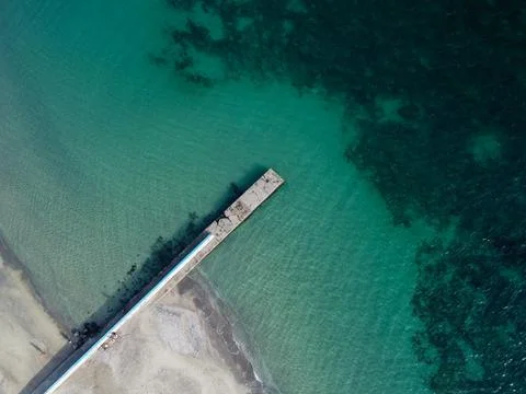 Beach and waves from top view. Turquoise water background from top view. 写真素材
